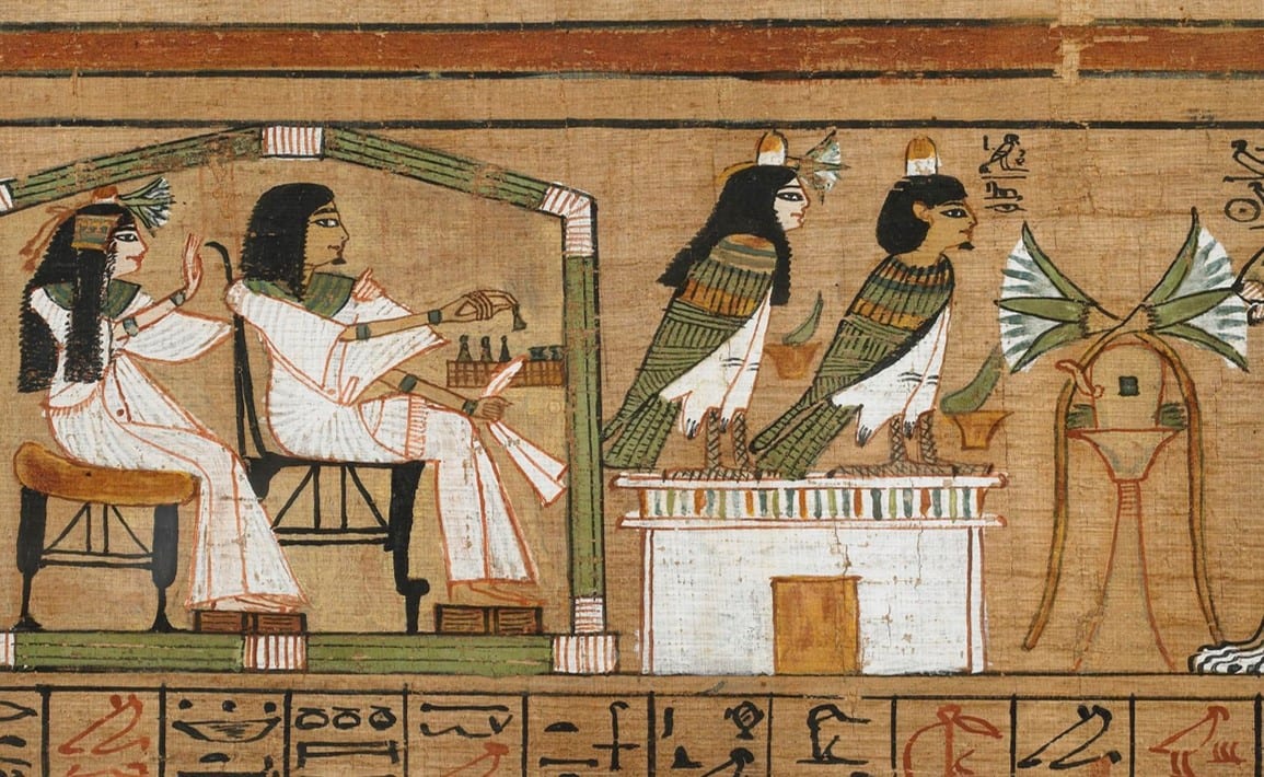 Rouleau de papyrus couvert d'écritures et de petites scènes peintes