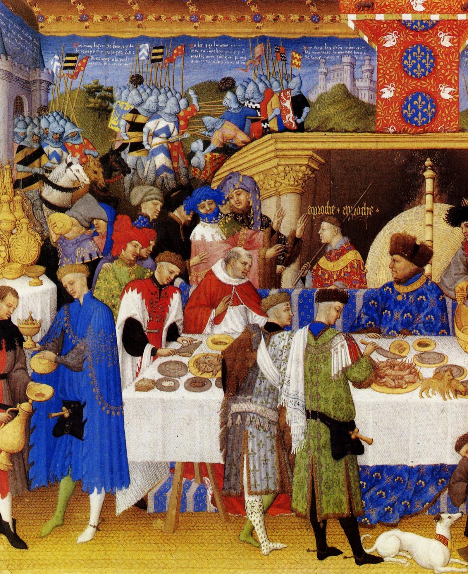 Enluminure d'un banquet : un seigneur vêtu de bleu attablé devant des serviteurs et des convives