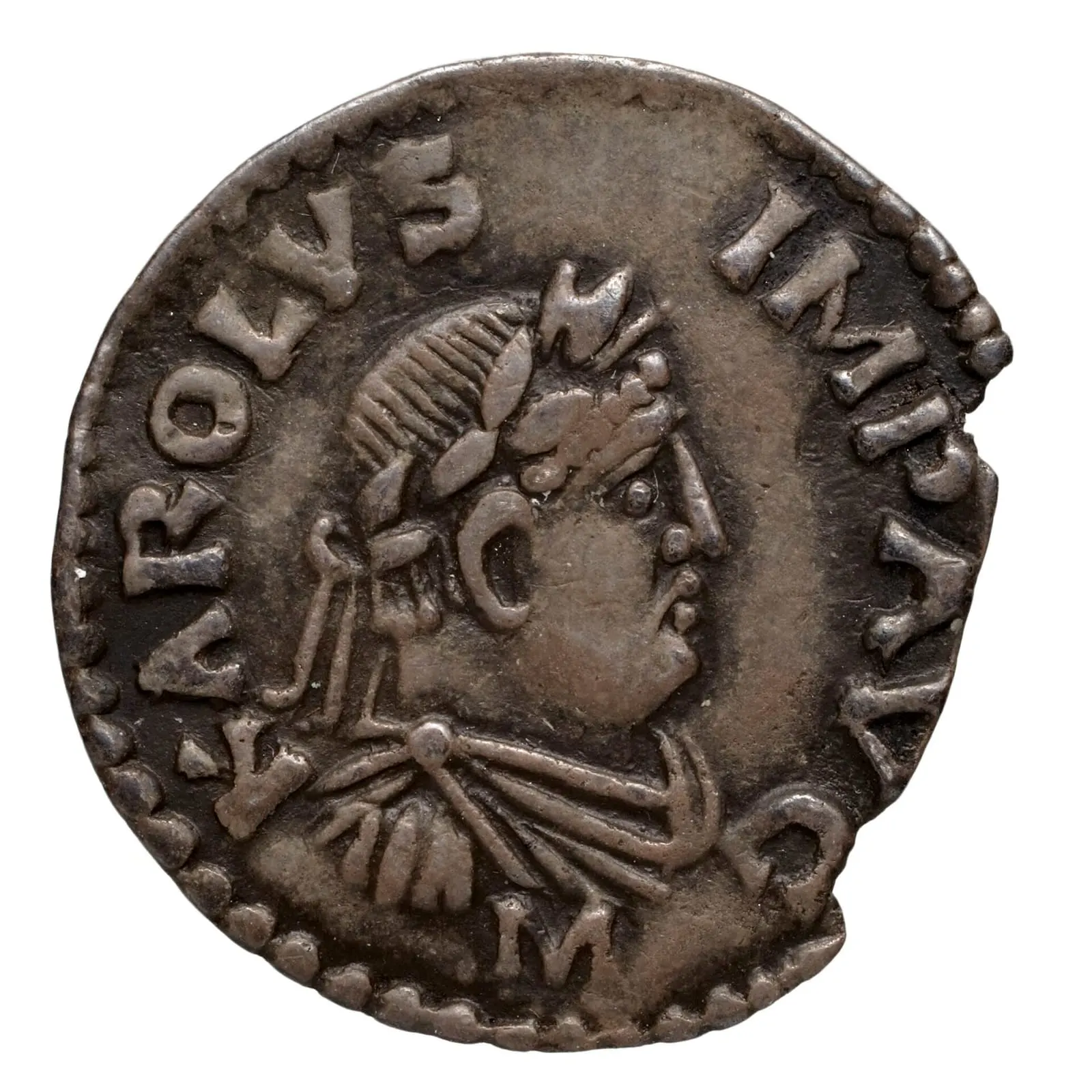 Monnaie d'argent portant un buste de profil couronné de lauriers et une inscription latine